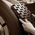 What does tire retreading involve?