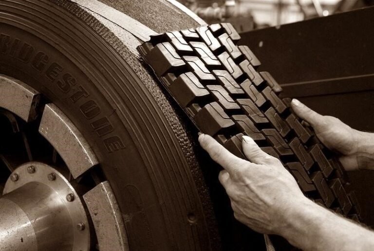 What does tire retreading involve?